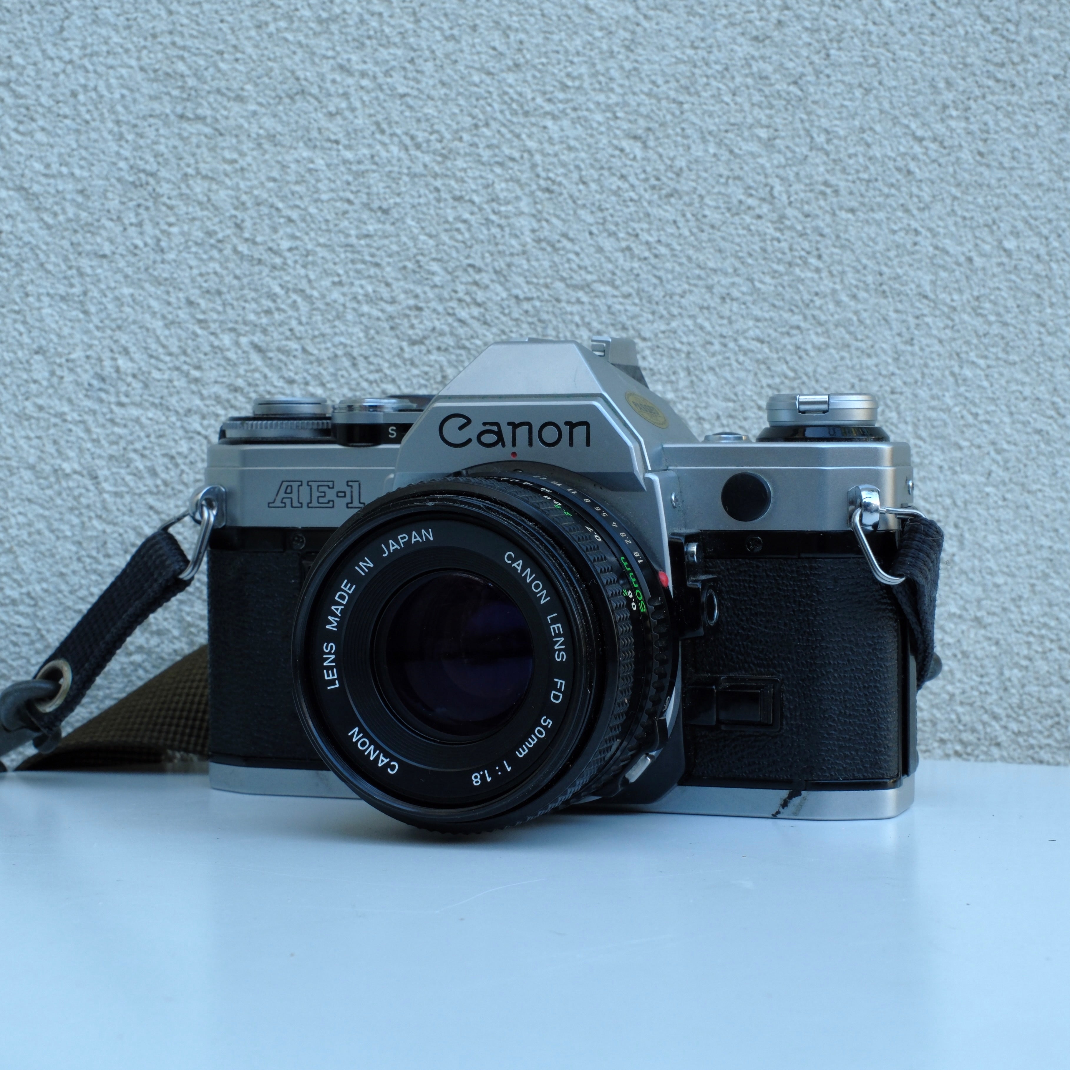 Canon AE-1 & selling 50 mm 1 : 1.8 Canon Made in Japan Lens